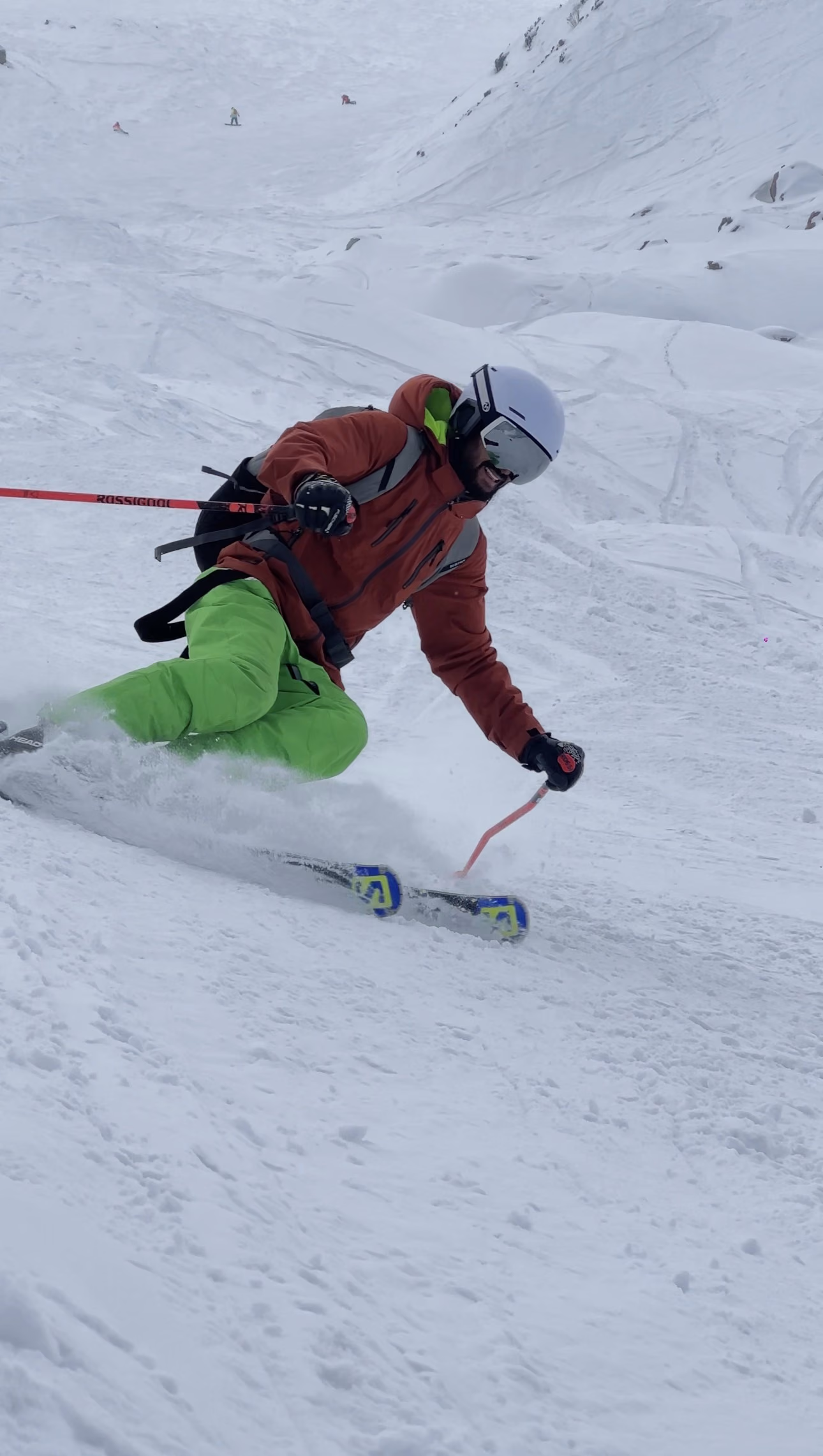 Skier turning on a snow covered slope in Gulmarg, Kashmir